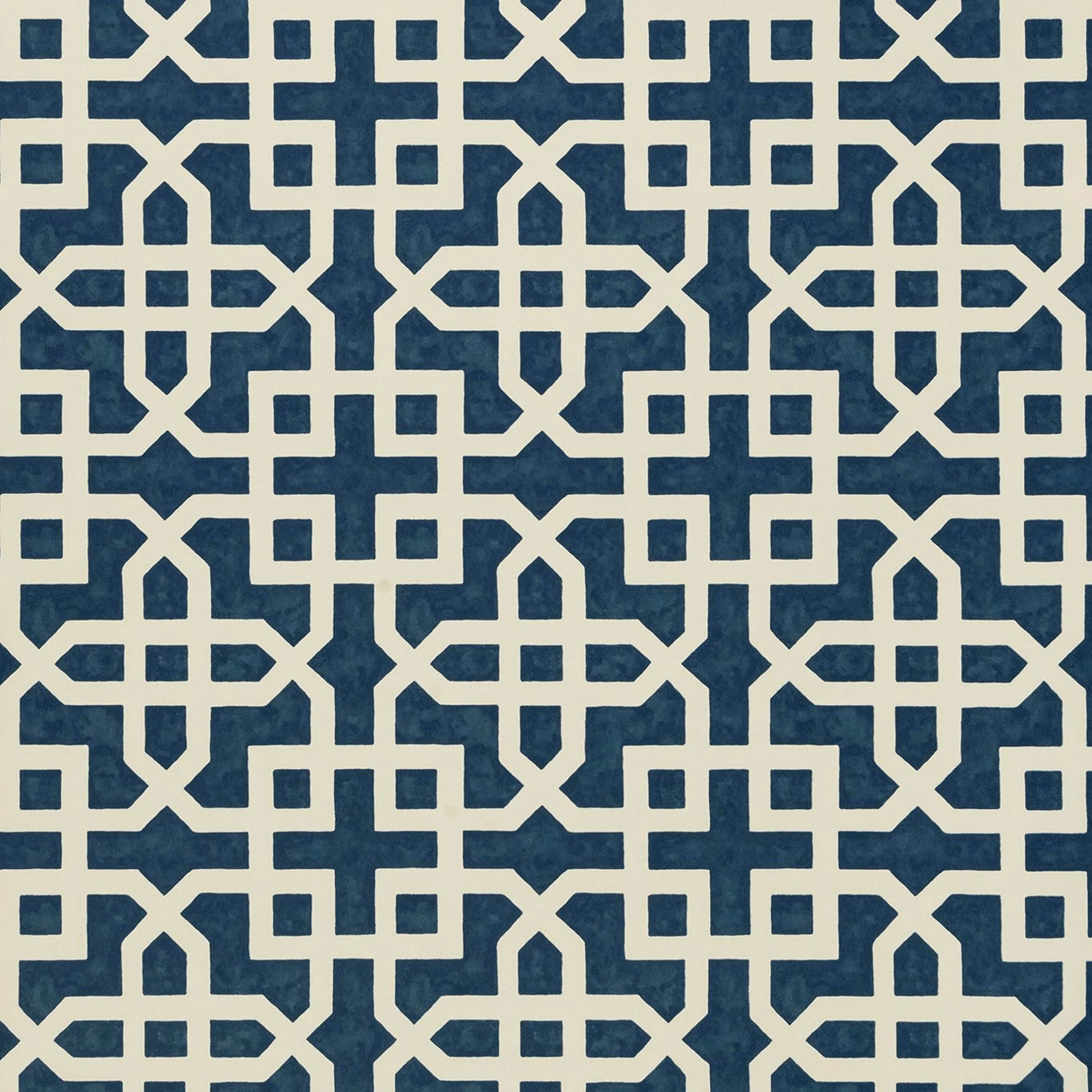 Deep indigo wallpaper with ivory interlocking trellis and small square motifs