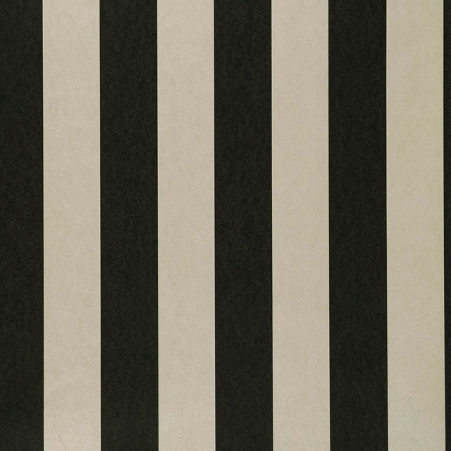 Deep ebony and pale ivory vertical stripes with a softly mottled surface
