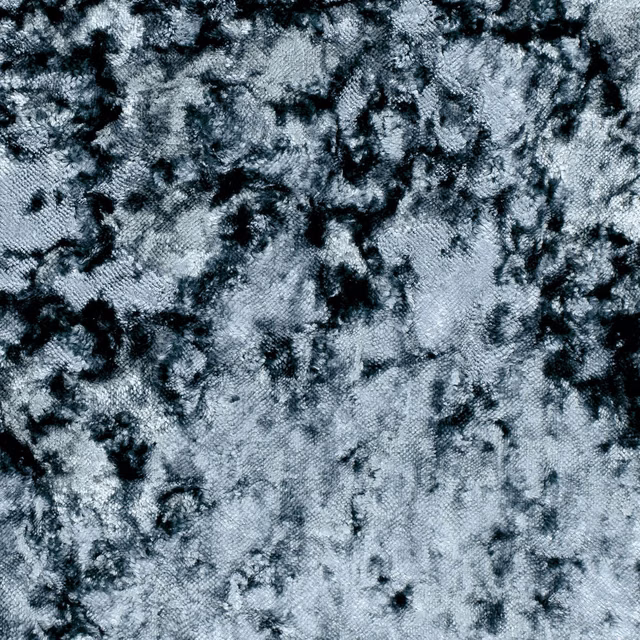 Close-up of cool ash grey crushed texture with irregular charcoal-black mottling