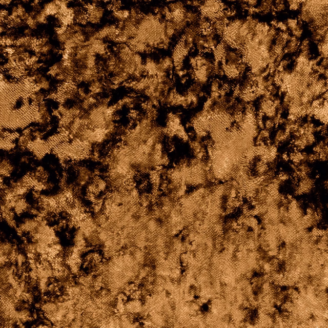 Burnished gold woven fabric with deep brown and black organic mottling