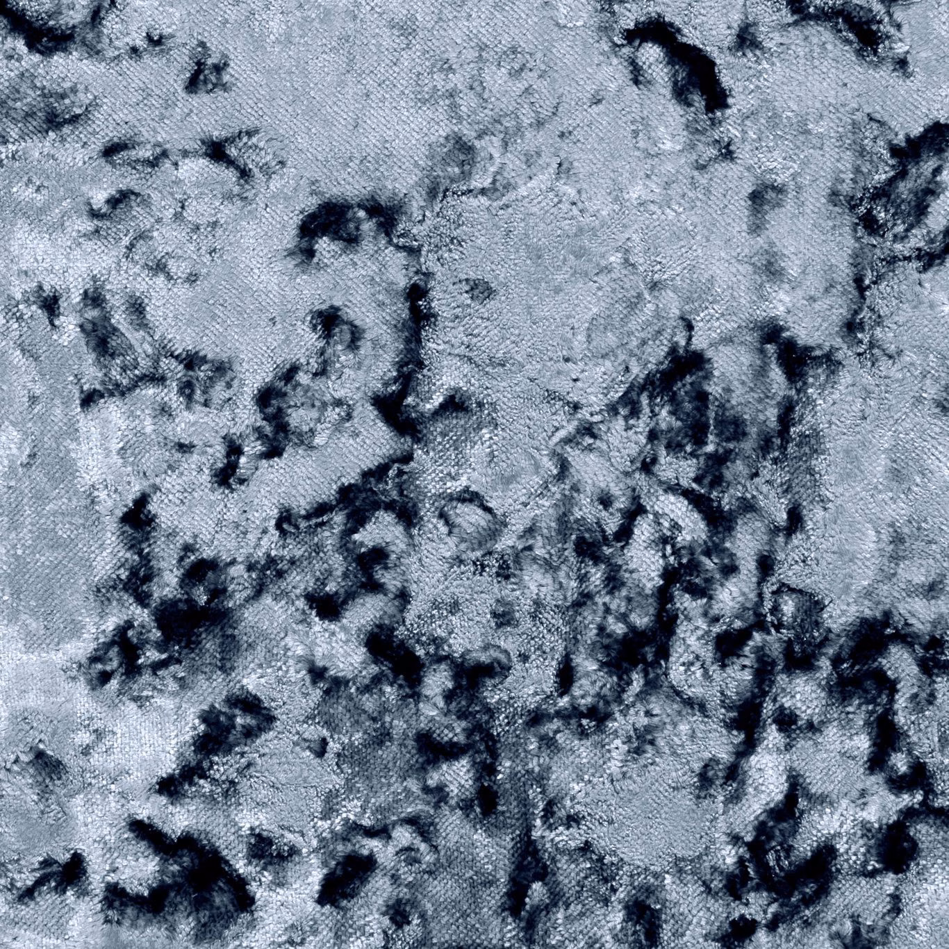 Cool pewter-grey textile with black inky mottling and a softly reflective woven surface