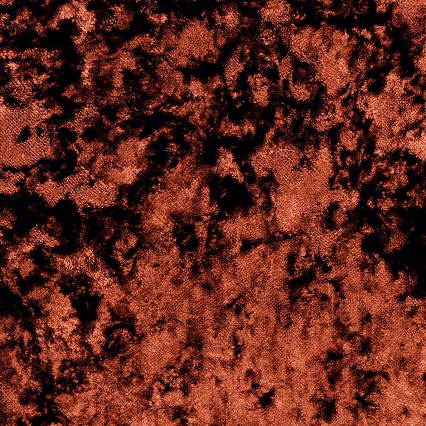 Mottled burnt terracotta and black textured upholstery fabric with copper-toned highlights