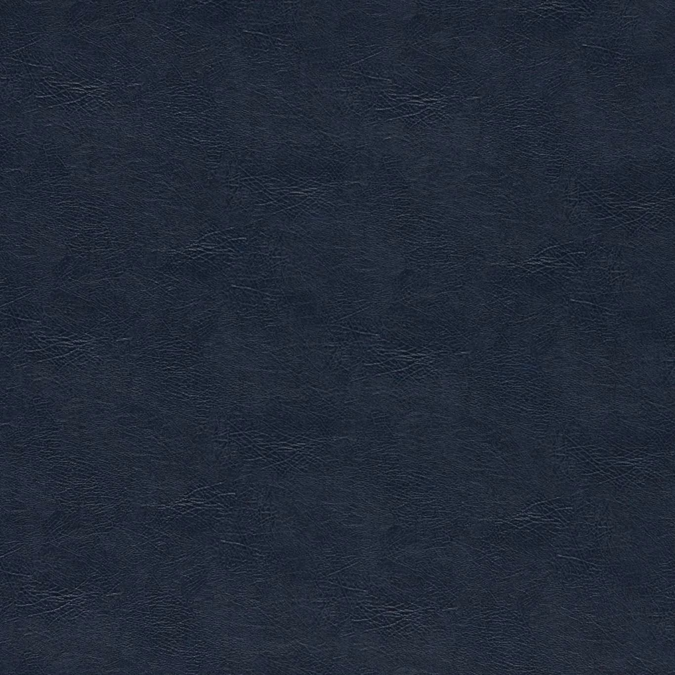 Deep midnight-blue textile with subtle crinkled texture and charcoal tonal variation