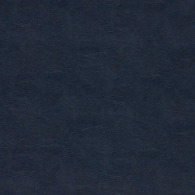 Deep midnight-blue textile with subtle crinkled texture and charcoal tonal variation