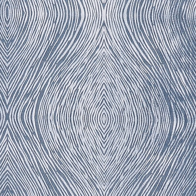 Cool denim-blue fabric with charcoal flowing oval lines and fine textured striations