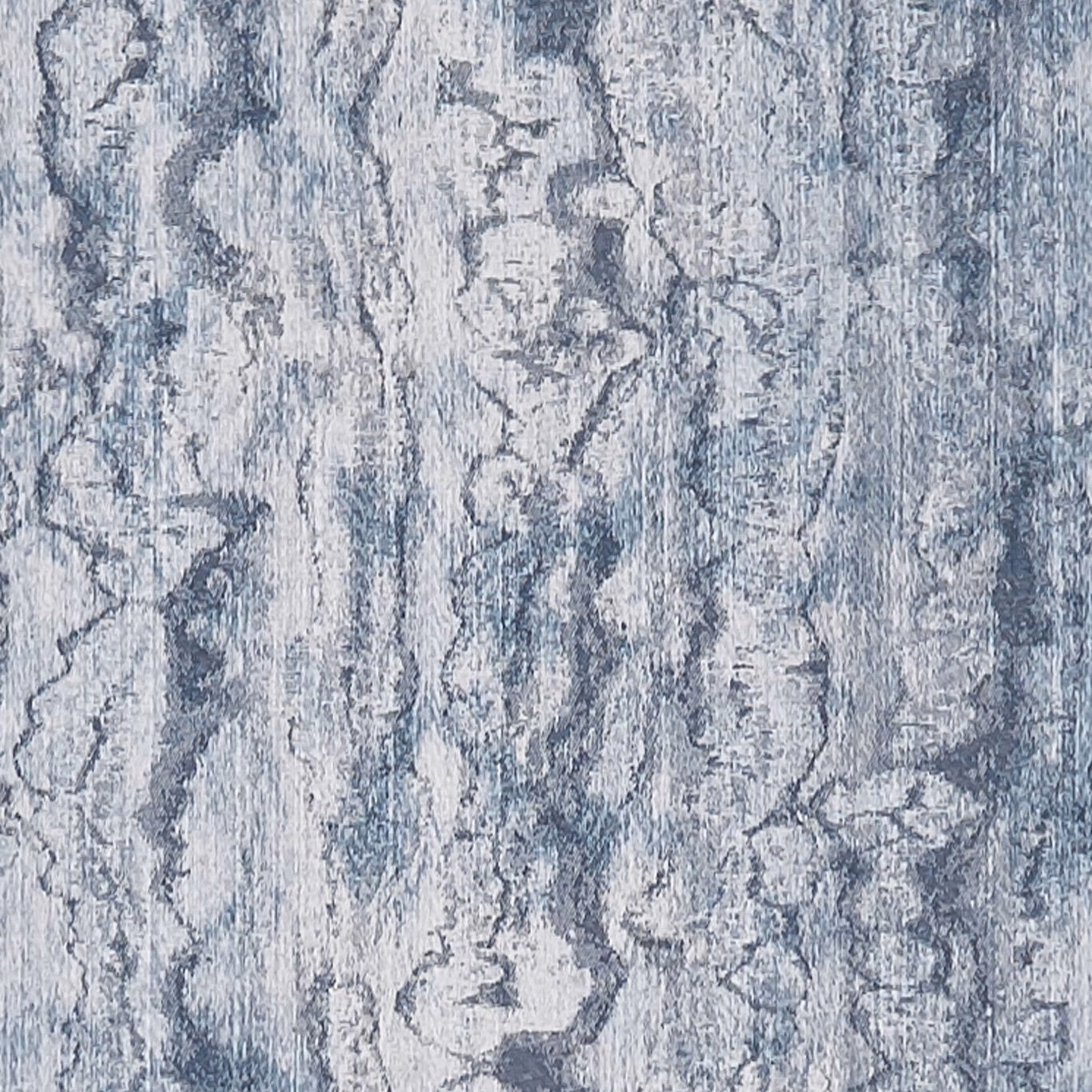 Mottled denim blue-grey fabric with vertical painterly marbling and pale textured highlights