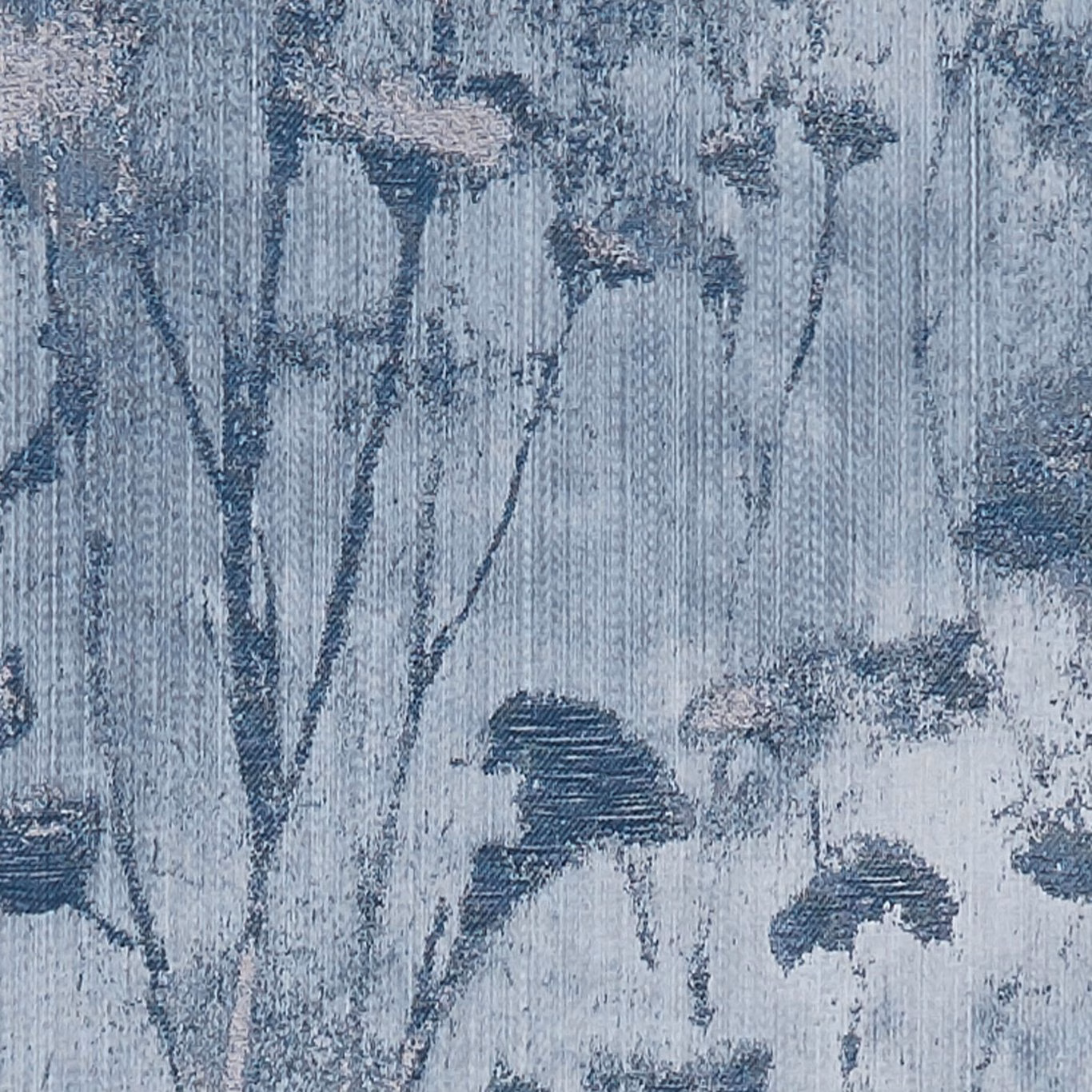Cool denim-blue botanical fabric with dark stems, blurred blooms and fine vertical woven texture