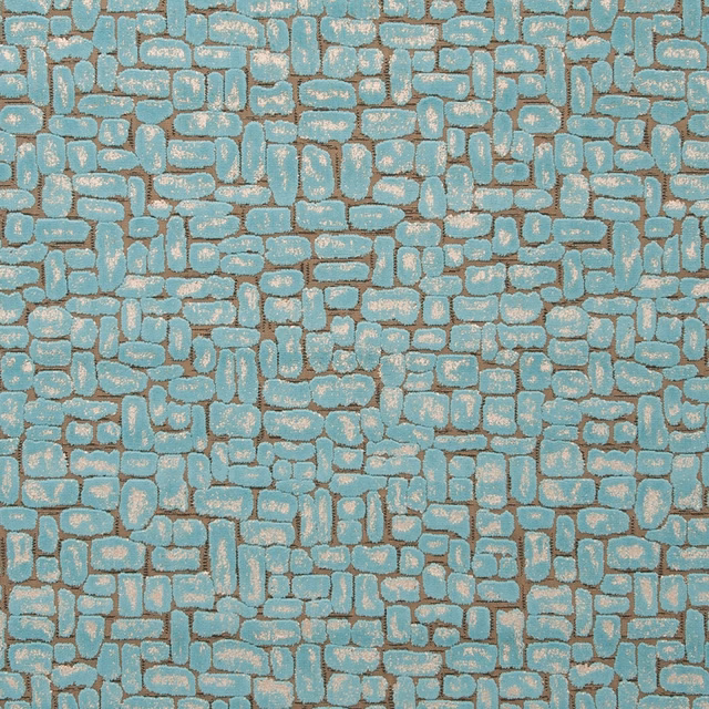 Muted aqua teal upholstery with irregular beige-edged pebble blocks in a tactile woven texture