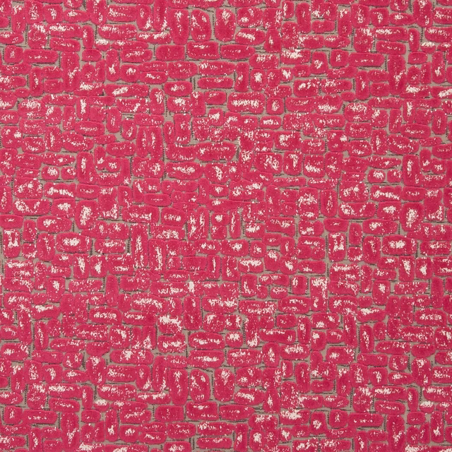 Saturated fuchsia fabric with small maze-like geometric marks and pale woven highlights