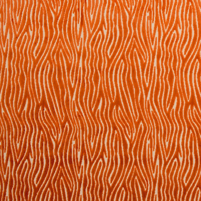 Warm spice-orange textile with raised cream contour lines in a dense repeat