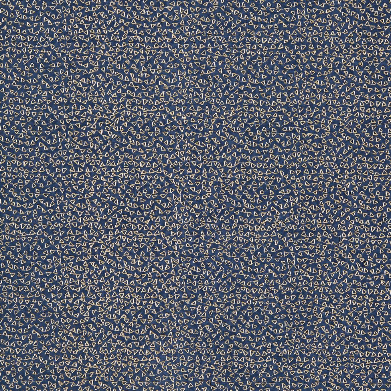 Deep midnight blue fabric with tiny pale geometric motifs and fine woven texture