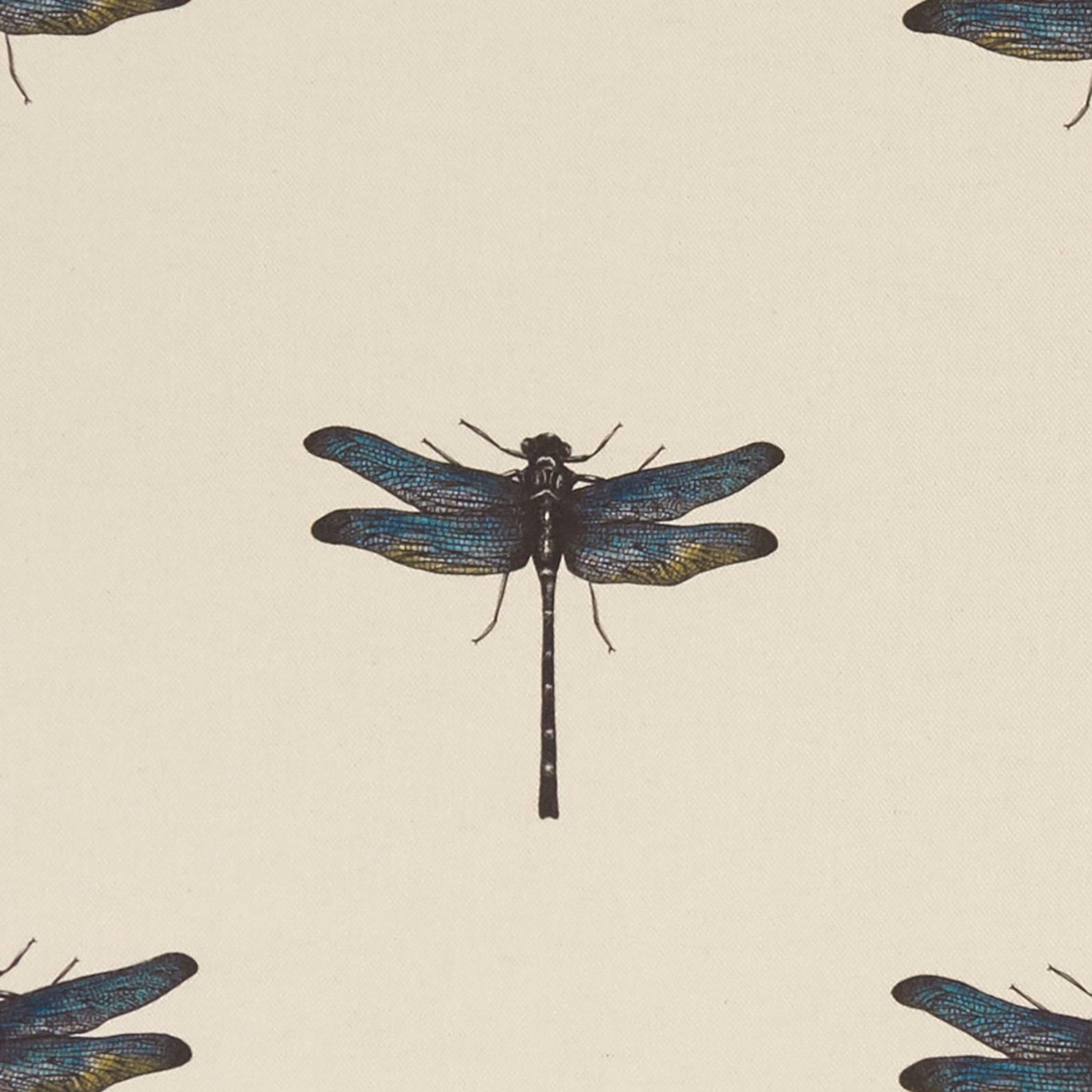 Cream fabric with a central dragonfly in blue, teal, charcoal and ochre