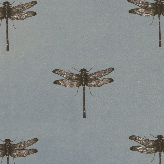 Cool blue-grey fabric with dark detailed dragonflies in a repeating layout