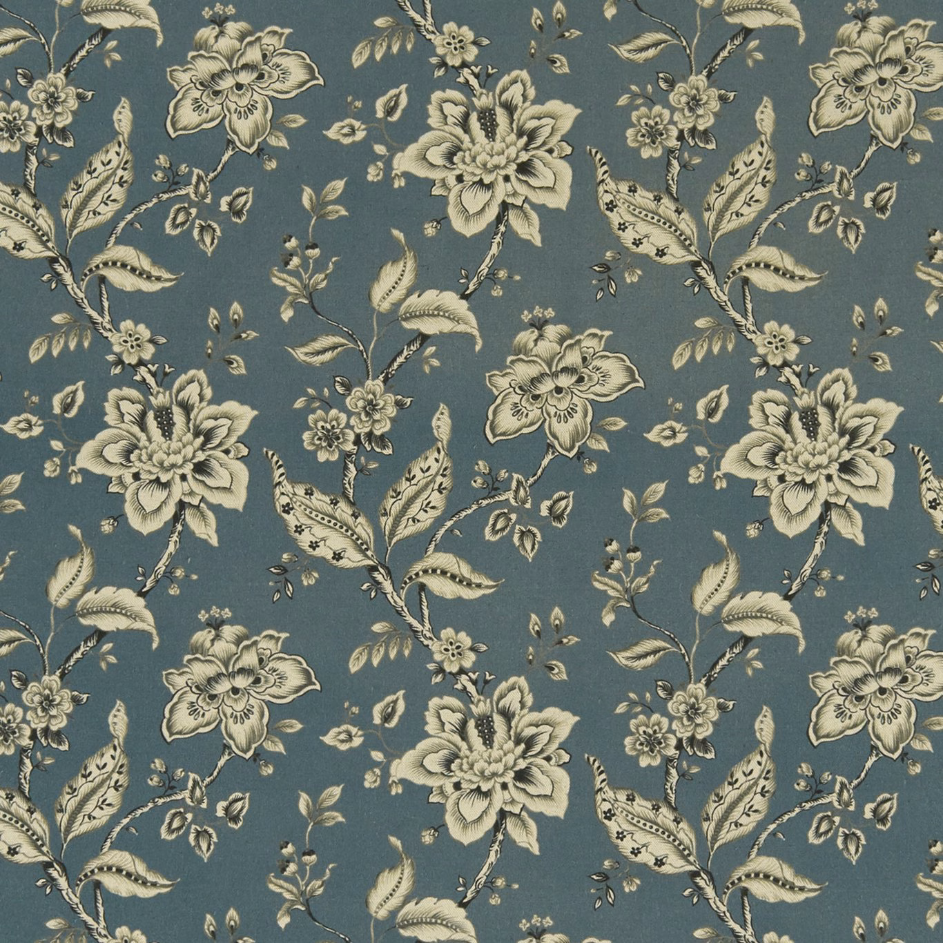 Muted denim-blue fabric with ivory palampore florals and curling leafy stems