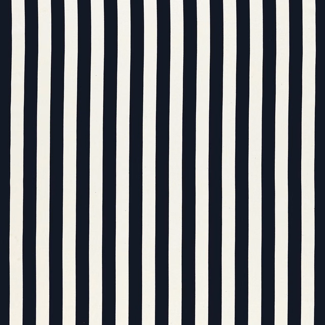 Ebony-black and ivory vertical stripes with subtly uneven edges and woven texture