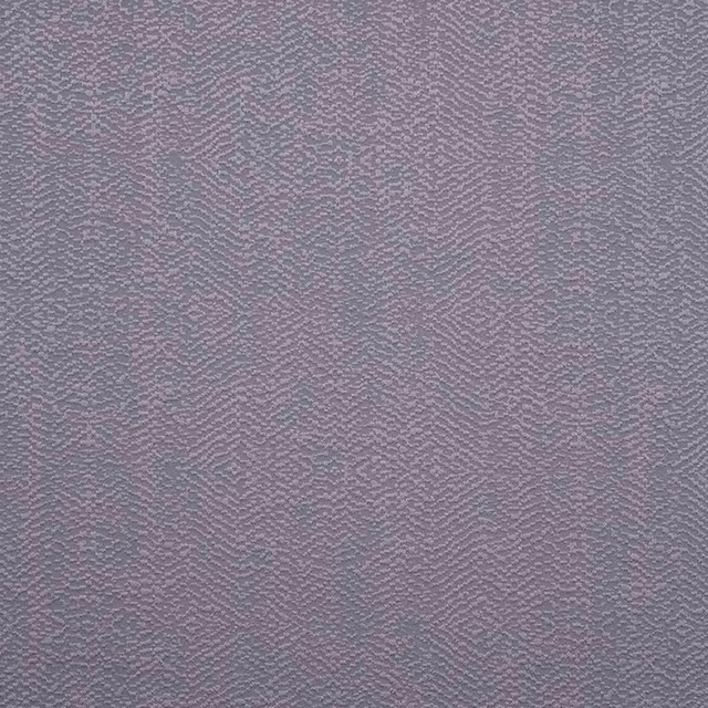 Close-up of mauve-flecked charcoal grey fabric with subtle rippled geometric weave