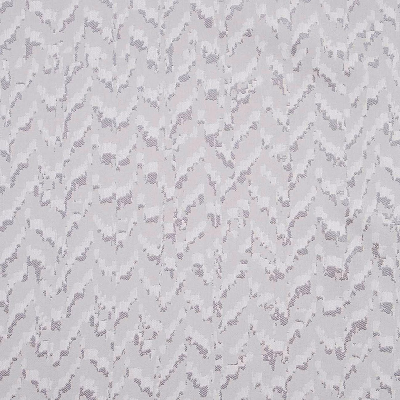 Cool silver-grey fabric with softly mottled lilac-grey abstract woven fragments
