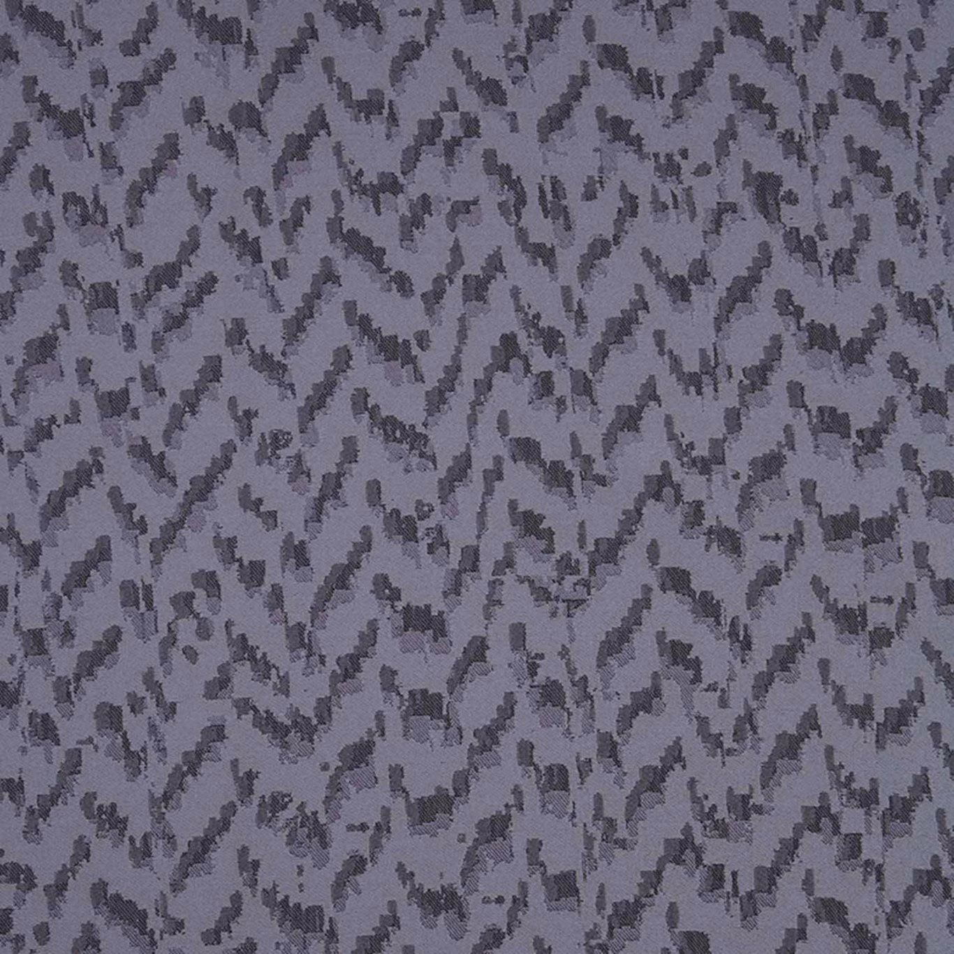 Cool zinc-grey woven ground with charcoal fragmented zigzag marks and lavender undertones