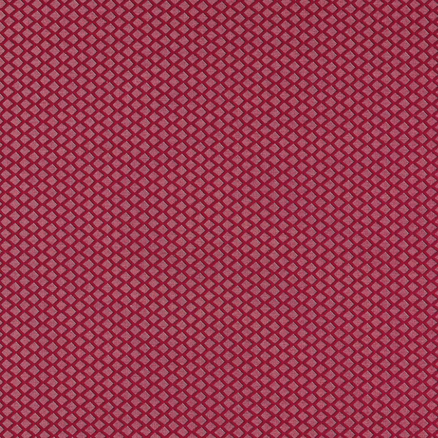 Deep ruby red woven fabric with a tightly spaced dark diamond lattice