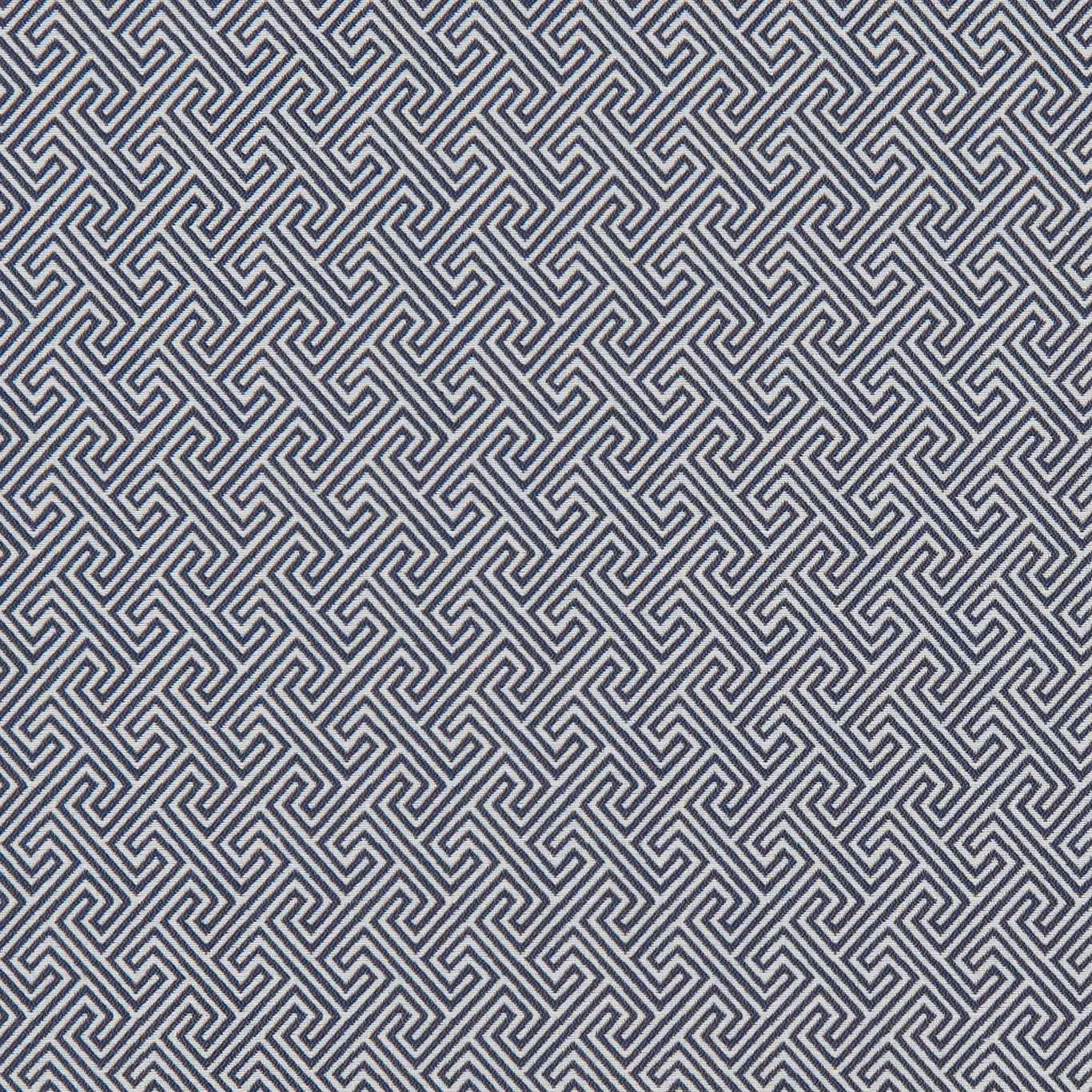 Midnight blue woven fabric with dense ivory-grey angular maze pattern