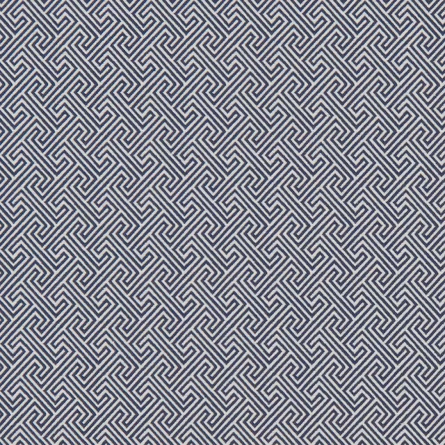 Midnight blue woven fabric with dense ivory-grey angular maze pattern