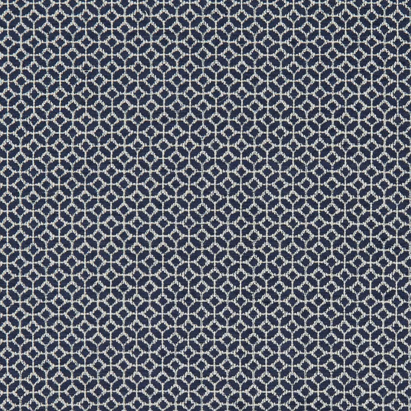 Midnight blue woven ground with a small ivory interlocking lattice motif