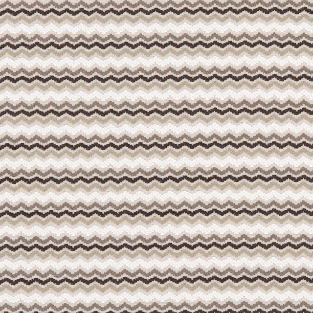 Close-up of charcoal, taupe and cream zigzag woven textile with a softly raised texture