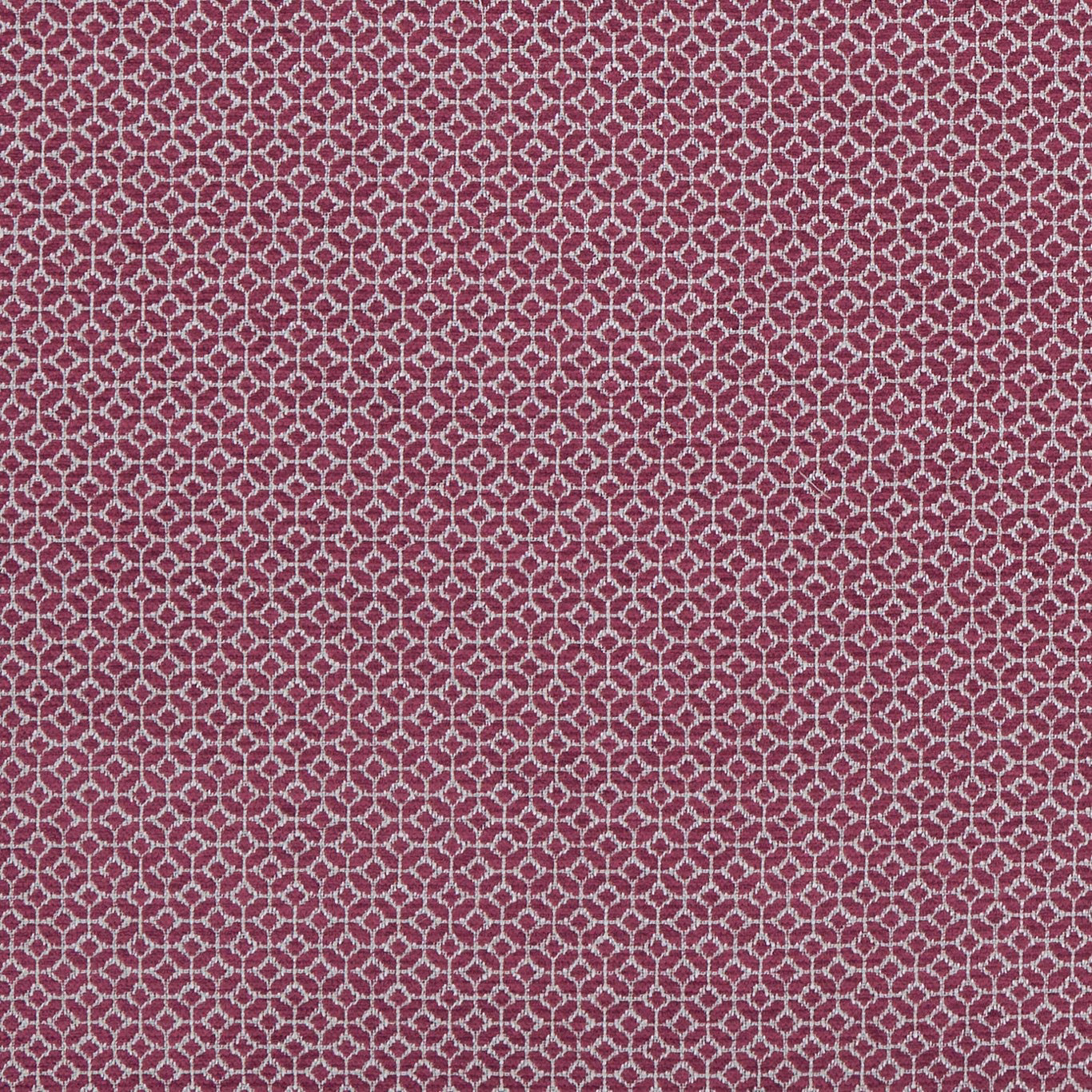 Deep raspberry woven fabric with a small ivory geometric lattice pattern