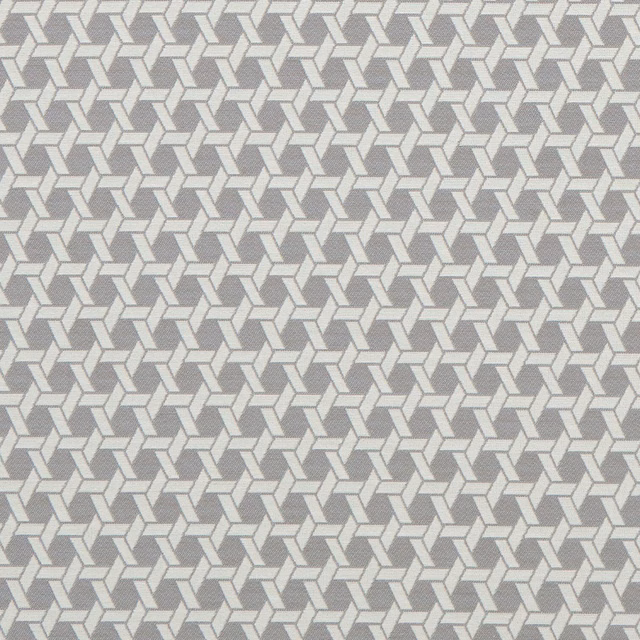 Charcoal grey woven ground with small pale interlocking geometric blocks