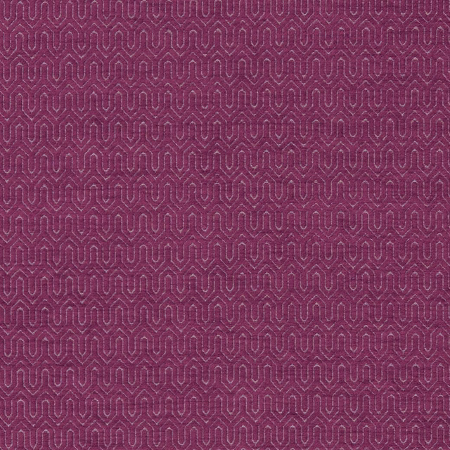 Deep raspberry woven fabric with fine linked geometric loops and subtle surface texture