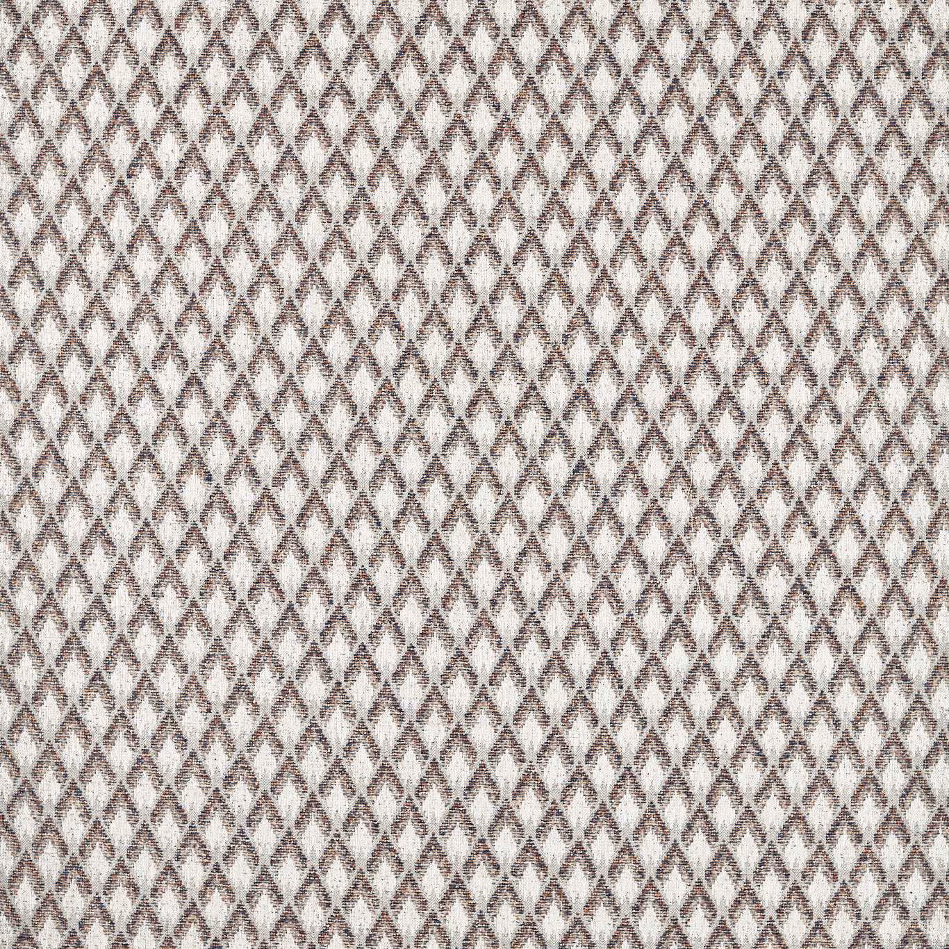 Cream woven upholstery with small denim-blue and rust diamond motifs