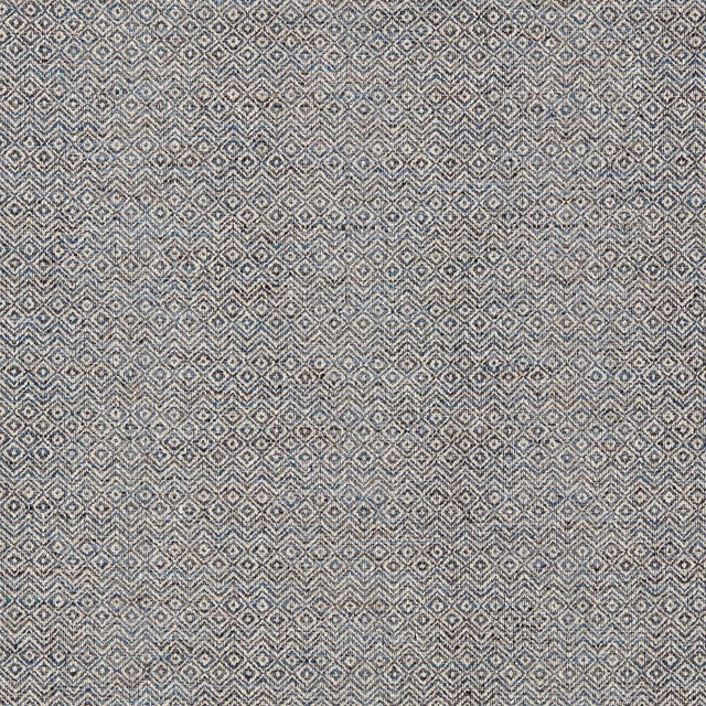 Midnight blue-grey woven fabric with tightly repeated pale diamond and zigzag motifs