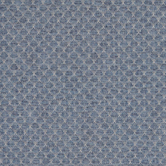 Muted denim-blue fabric with densely woven pale fan and scallop motifs