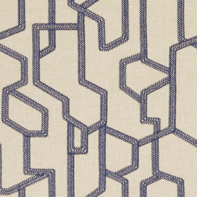 Cream woven fabric with interlocking midnight-blue labyrinth lines and subtle crosshatch texture