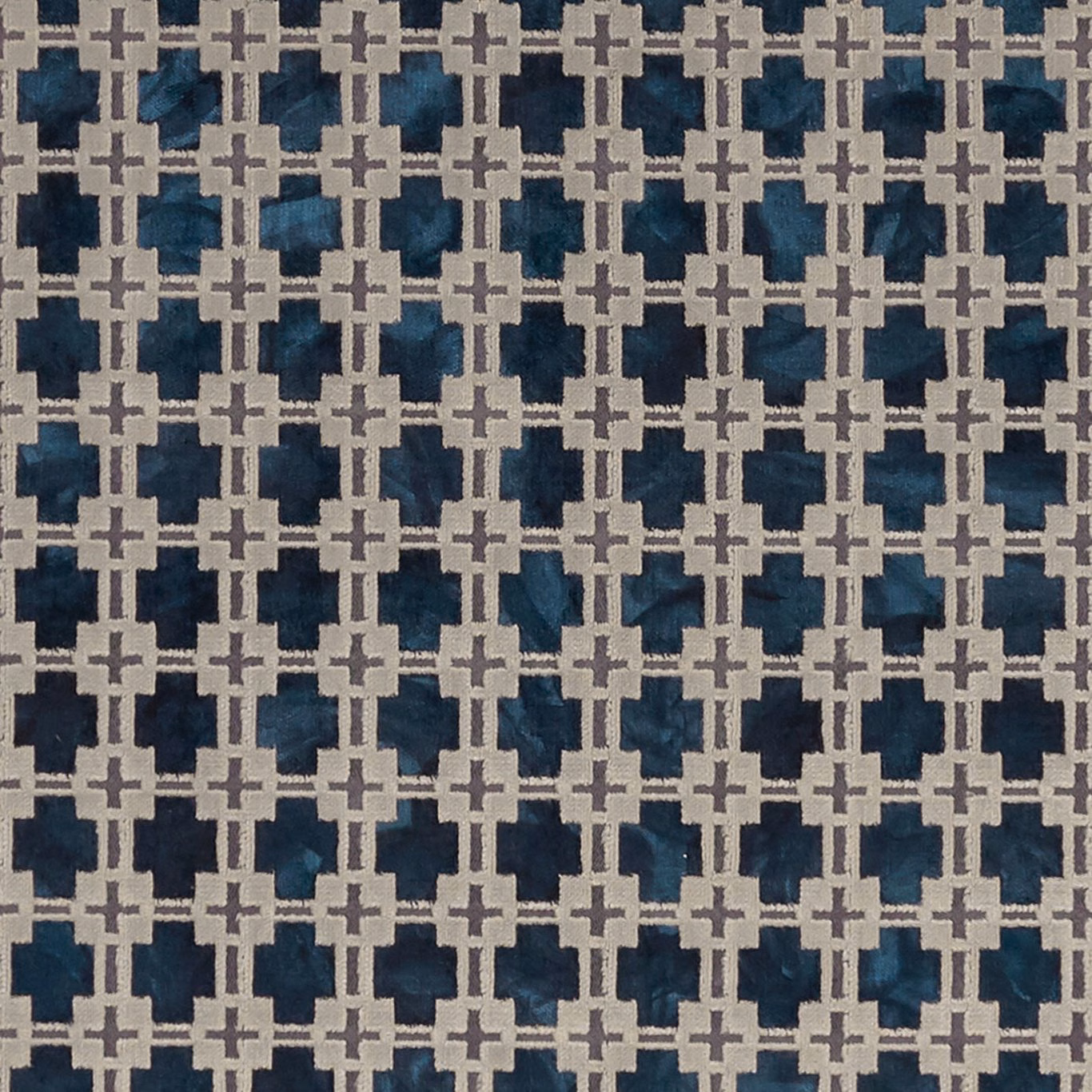 Navy and teal geometric woven fabric with pale grey lattice crosses