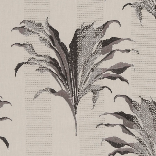 Charcoal and muted mauve botanical leaves on a pale grey woven ground