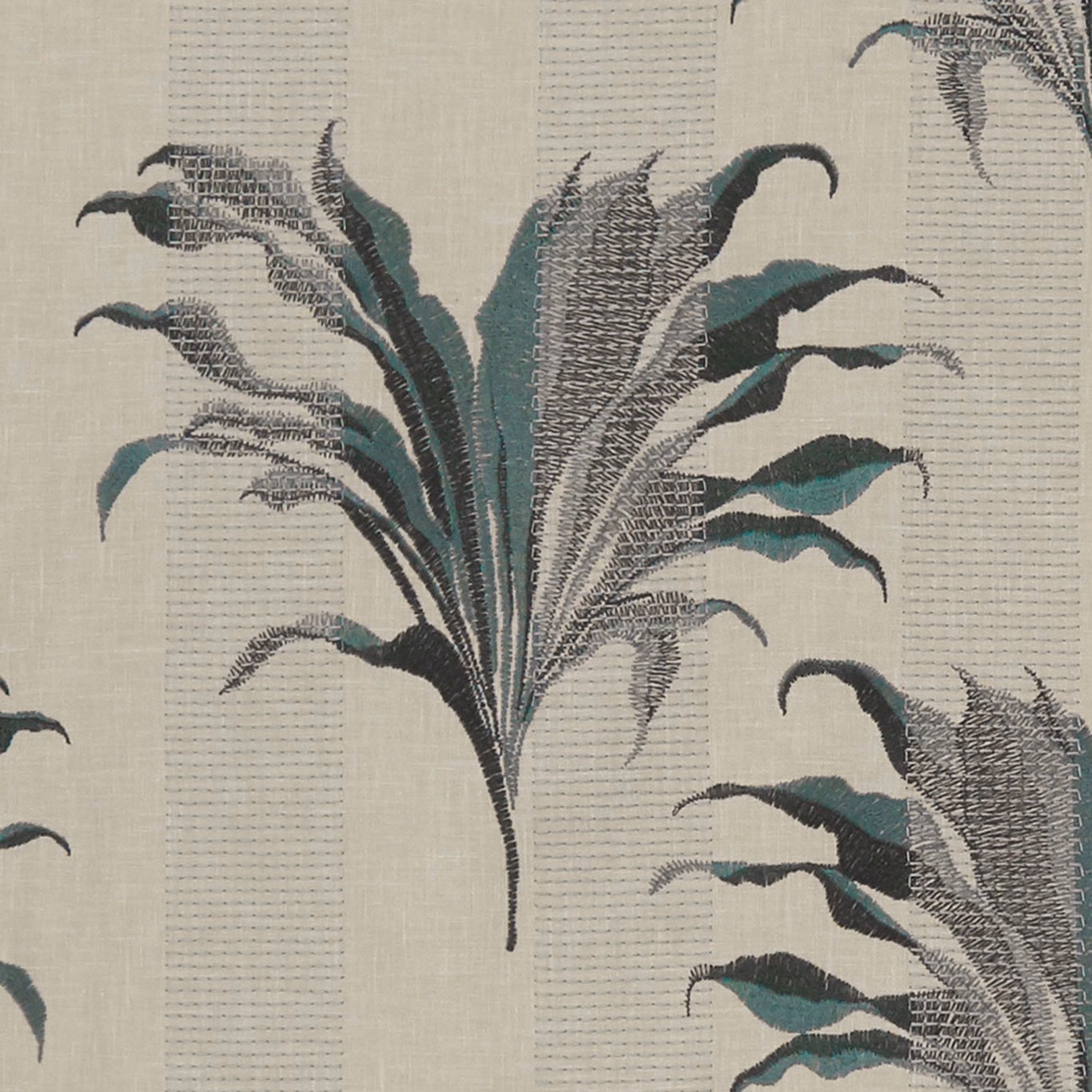 Kingfisher teal and charcoal botanical leaves on a pale textured woven ground