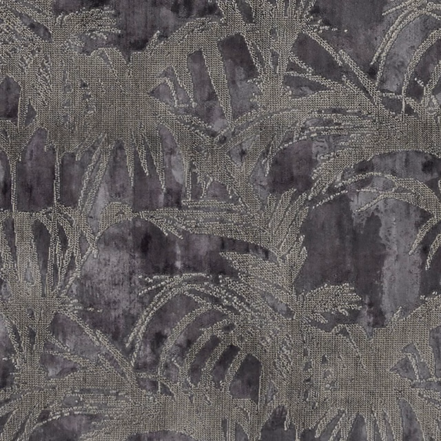Charcoal plum fabric with textured grey tropical foliage and a smoky mottled ground
