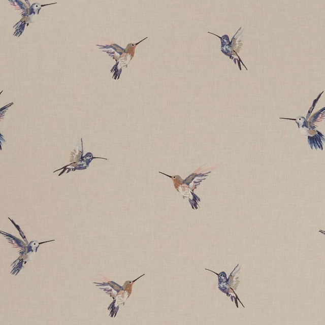 Warm beige woven fabric with scattered blue and rust hummingbirds in flight