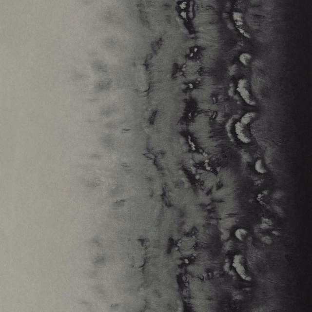 Cool silver-grey wallpaper with a charcoal vertical band and distressed pale marks