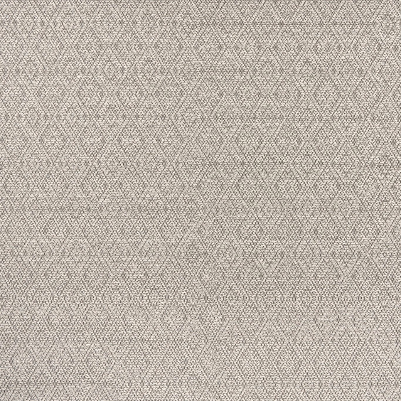 Close-up of charcoal-grey fabric with pale linked diamonds in a dense geometric weave