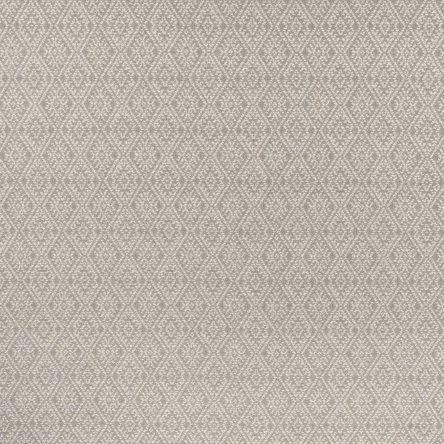 Close-up of charcoal-grey fabric with pale linked diamonds in a dense geometric weave