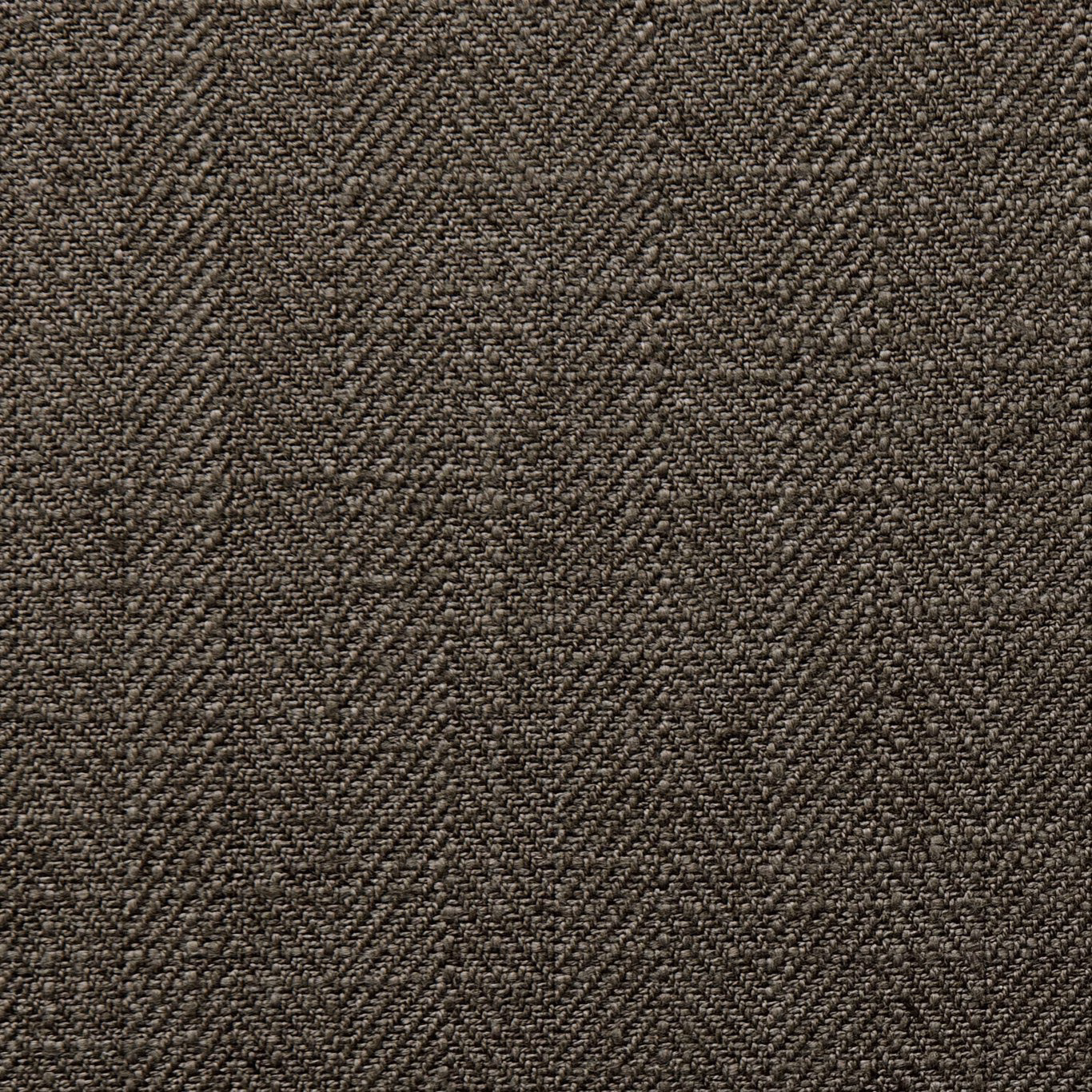 Close-up of deep espresso-brown woven upholstery fabric with irregular tactile texture