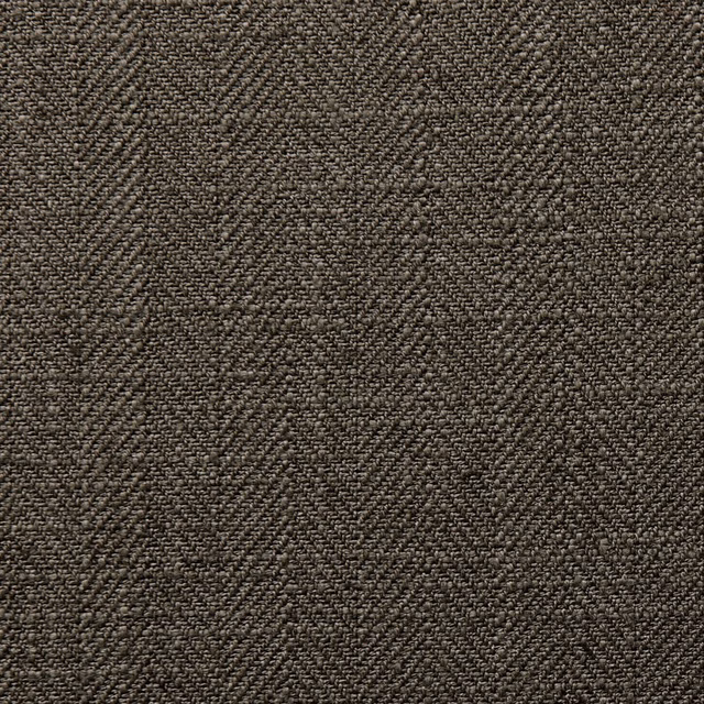Close-up of deep espresso-brown woven upholstery fabric with irregular tactile texture