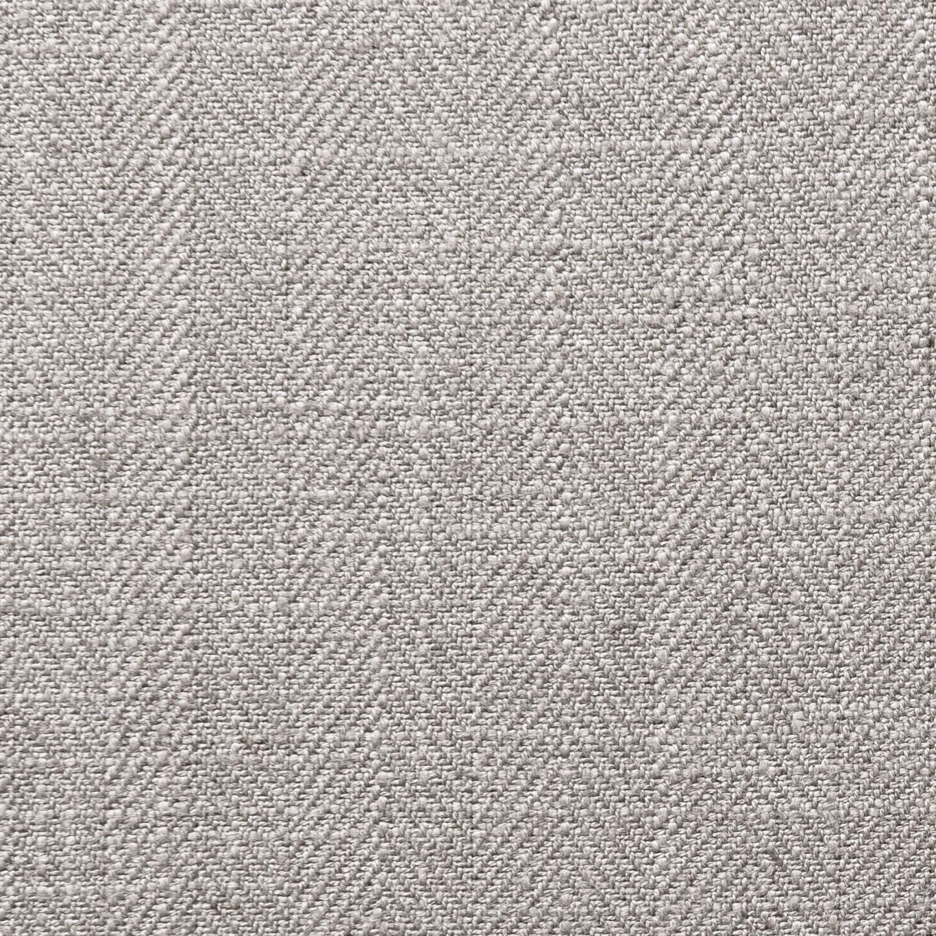 Close-up of softly mottled silver-grey woven upholstery fabric with fine textured flecks