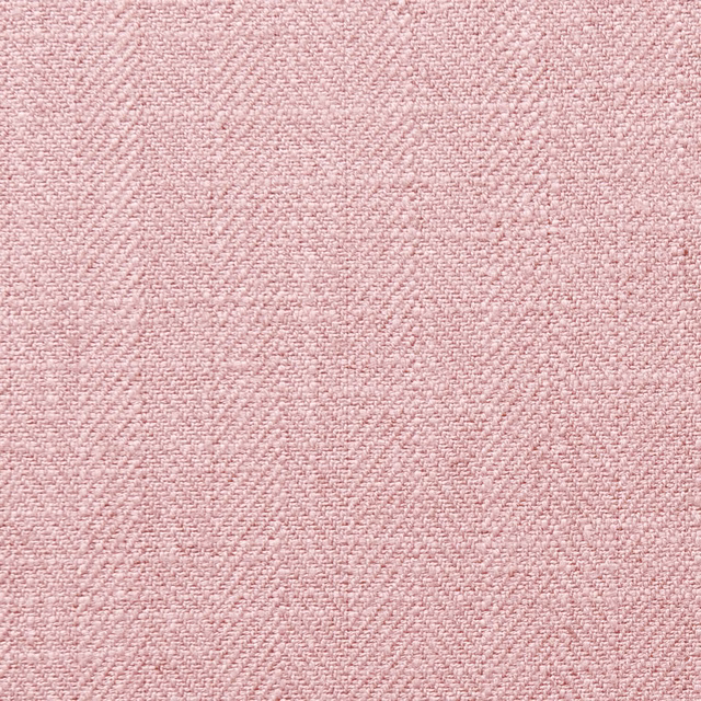 Close-up of blush pink Henley fabric with a softly irregular woven texture
