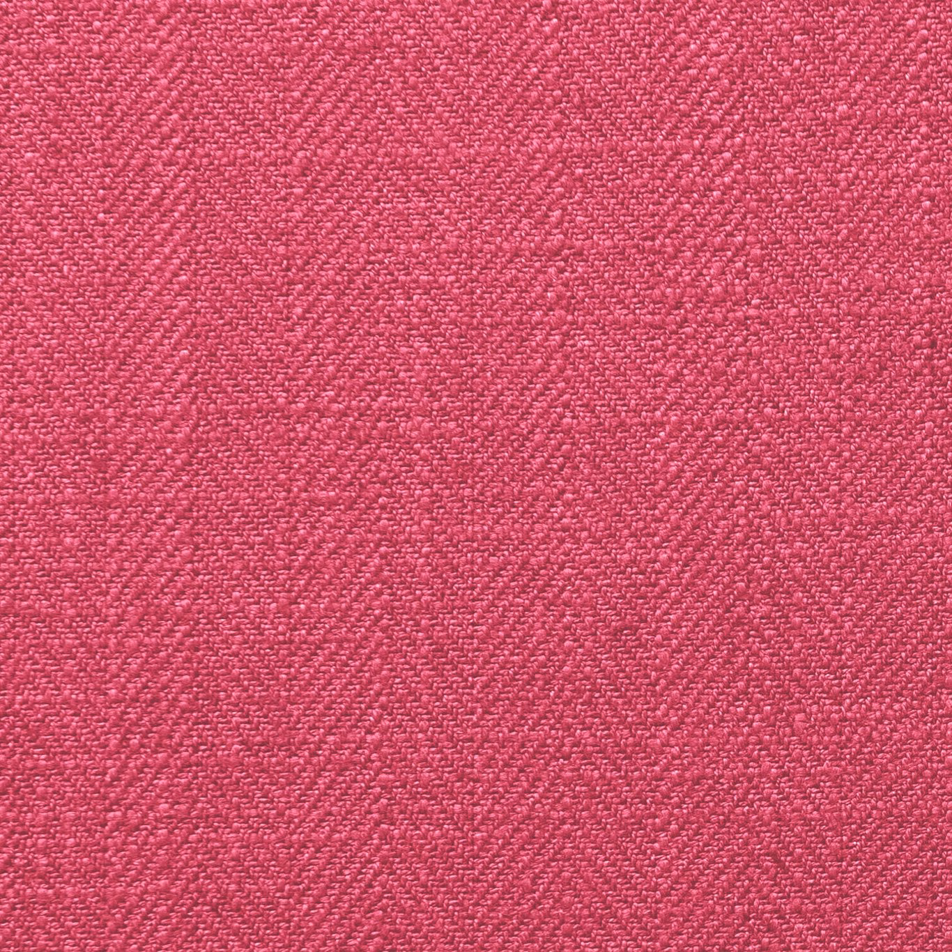 Close-up of saturated raspberry-pink fabric with a fine textured woven surface