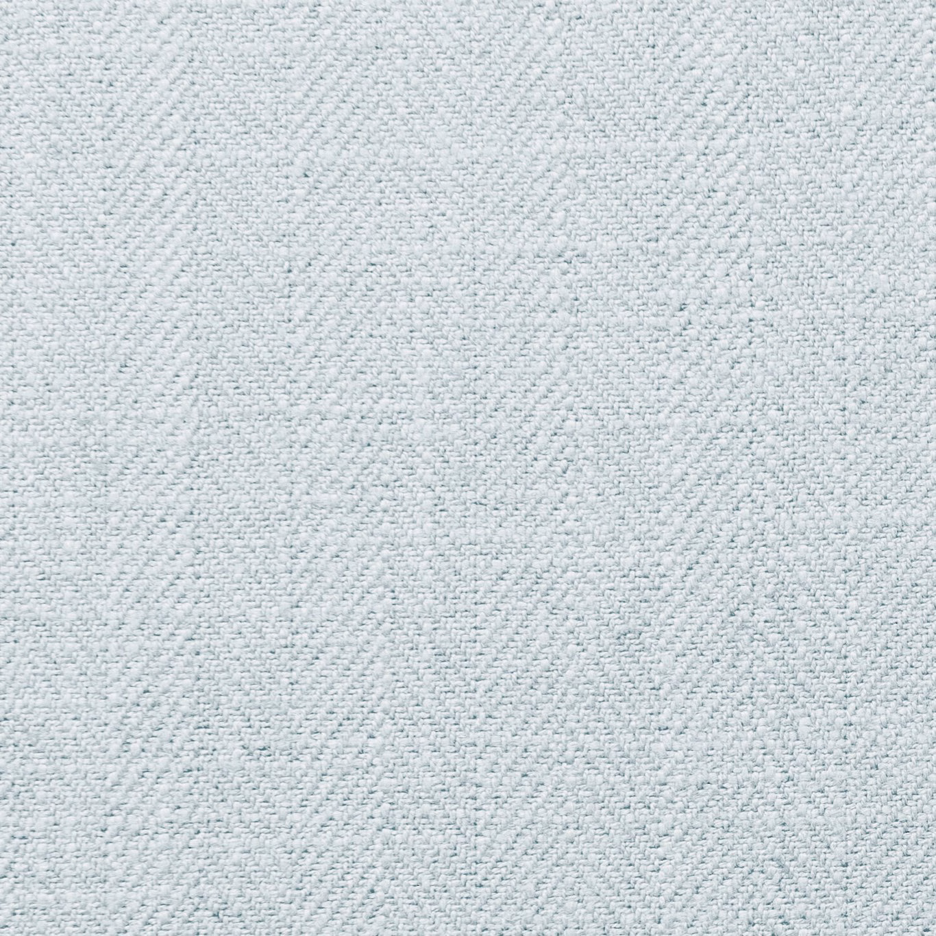 Close-up of pale icy blue-grey fabric with a fine irregular woven texture