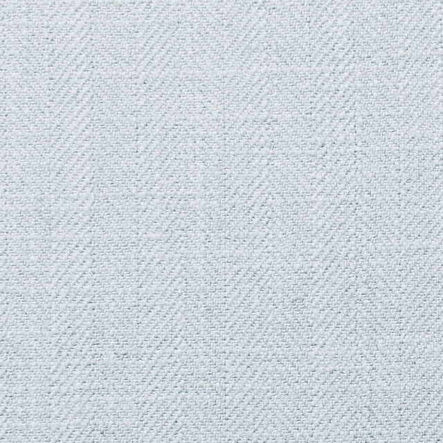 Close-up of pale icy blue-grey fabric with a fine irregular woven texture