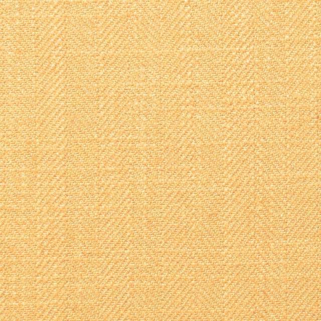 Close view of warm sunflower-yellow woven texture with fine diagonal highlights